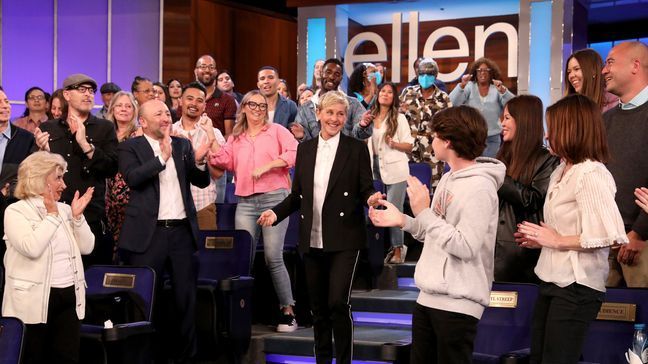 In this photo released by Warner Bros., talk show host Ellen DeGeneres, center, is applauded by the audience during the final taping of "The Ellen DeGeneres Show" at the Warner Bros. lot in Burbank, Calif. (Michael Rozman/Warner Bros. via AP)