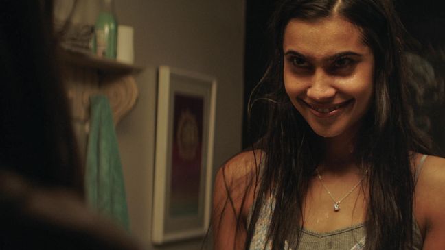 SOPHIA TAYLOR ALI stars as Penelope in "Blumhouse’s Truth or Dare," a supernatural thriller from Blumhouse Productions.  A harmless game of “Truth or Dare” among friends turns deadly when someone—or something—begins to punish those who tell a lie—or refuse the dare. (Photo: Universal Pictures)