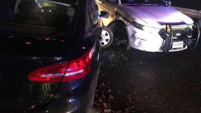 Driver sips 'Milwaukee's Best' during traffic stop, later crashes into two squad cars (Montgomery County Police Department)