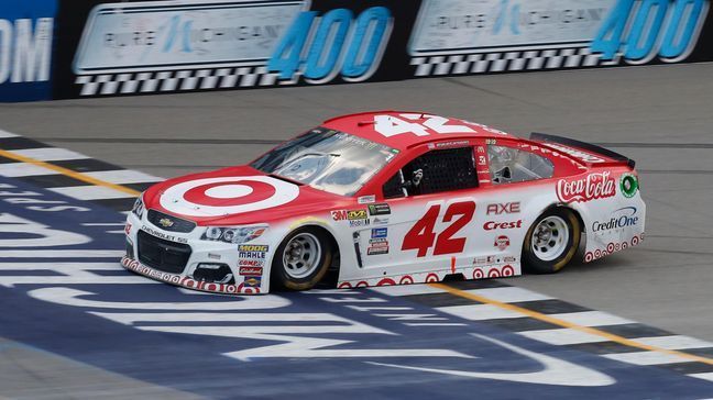 Kyle Larson crosses the finish line to win the NASCAR Cup Series auto race in Brooklyn, Mich., Sunday, Aug. 13, 2017. (AP Photo/Paul Sancya)