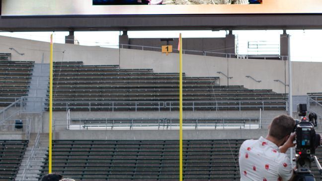 Sports producer Alex Altman proposes to his college sweetheart Jessica Waite at Autzen Stadium on August 11, 2018. (Matt Scotton photo)