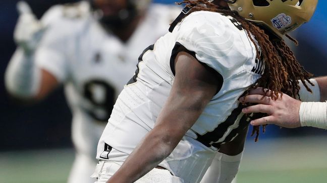 Central Florida linebacker Shaquem Griffin (18) celebrates a sack on Auburn quarterback Jarrett Stidham (8) during the second half of the Peach Bowl NCAA college football game, Monday, Jan. 1, 2018, in Atlanta. (AP Photo/John Bazemore)