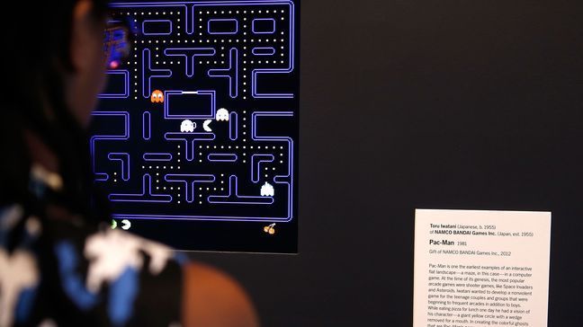 FILE Janelle Grace plays "Pac-Man" which is one of the 14 video games that are part of the exhibiton "Applied Designs" during the "Applied Design" press preview at The Museum of Modern Art on March 1, 2013 in New York City.  (Photo by Jemal Countess/Getty Images)