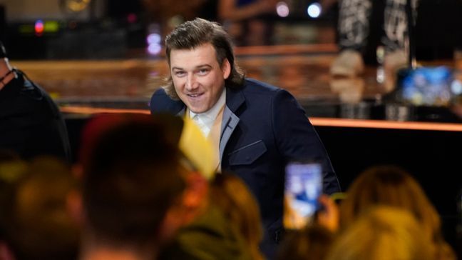 Morgan Wallen accepts the award for album of the year for "Dangerous: The Double Album" at the 57th Academy of Country Music Awards on Monday, March 7, 2022, at Allegiant Stadium in Las Vegas. (AP Photo/John Locher)