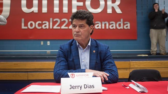 Jerry Dias, president of UNIFOR, the union representing the workers of Oshawa's General Motors car assembly plant, speaks to the workers at the union headquarters, in Oshawa, Ont. on Monday, Nov. 26, 2018. (Eduardo Lima/The Canadian Press via AP)