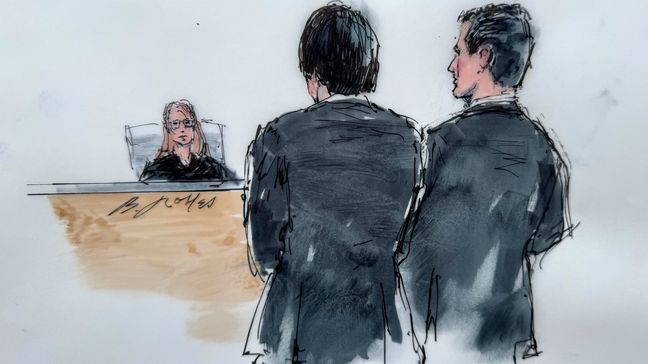 In this courtroom sketch, Ippei Mizuhara, front left, the former longtime interpreter for baseball player Shohei Ohtani, is joined by his attorney, Michael G. Freedman, in front of U.S. Magistrate Judge Maria A. Audero in Los Angeles on Friday, April 12, 2024. Mizuhara, charged with a single count of bank fraud, was ordered to undergo gambling addiction treatment. (Bill Robles via AP)