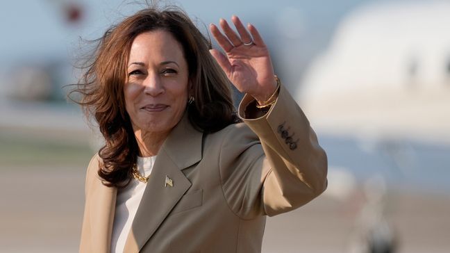 Vice President Kamala Harris waves upon arrival at Andrews Air Force Base in Md., Saturday, July 27, 2024. (AP Photo/Stephanie Scarbrough, Pool)