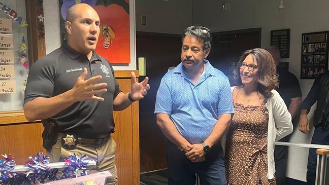 Officer Dave Garza and Dispatcher Judy Garza logged each other off for the final time (Photo: FPD)