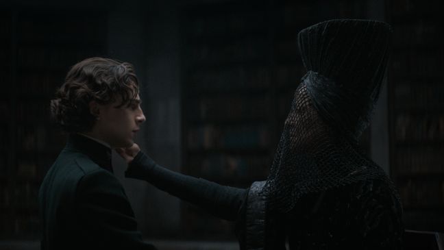 (L-r) TIMOTHÉE CHALAMET as Paul Atreides and CHARLOTTE RAMPLING as Reverend Mother Mohiam in Warner Bros. Pictures’ and Legendary Pictures’ action adventure “DUNE,” a Warner Bros. Pictures and Legendary release (Photo: Warner Bros.)