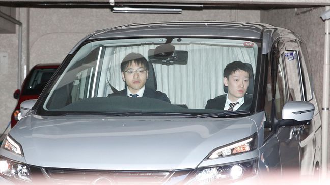 A car which is believed to be carrying Nissan former Chairman Carlos Ghosn leaves an apartment building early Thursday, April 4, 2019 in Tokyo. (Takuya Inaba/Kyodo News via AP)