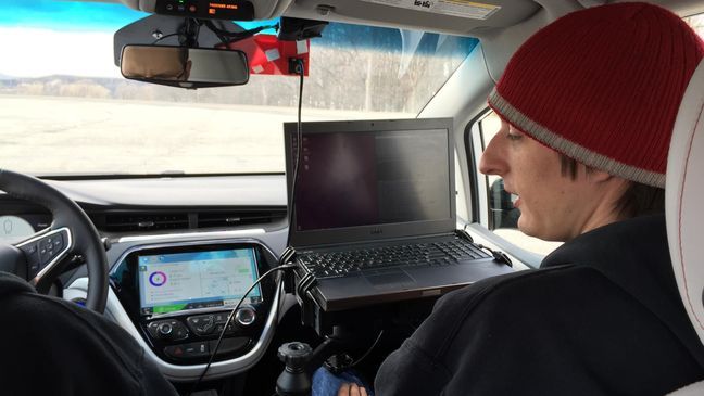 Derek Chopp at the computer of Michigan Technological University autonomous car, March 15, 2018 (WLUK/Eric Peterson)