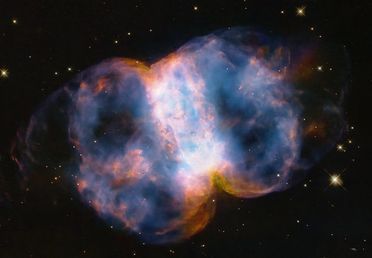 Image for story: NASA's Hubble Telescope marks 34 years with new photo of 'Little Dumbbell'