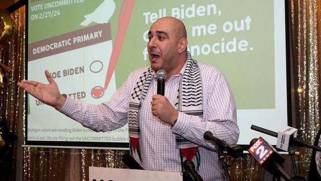 Abbas Alawich speaks during an election night gathering, Tuesday, Feb. 27, 2024, in Dearborn, Mich. (AP Photo/Carlos Osorio)