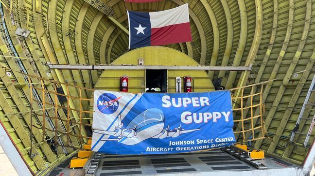 NASA's Super Guppy, a specialized aircraft with a unique hinged nose, on display in Boeing Plaza at EAA AirVenture 2023, July 25, 2023. (WLUK/Lexi Schroeder)