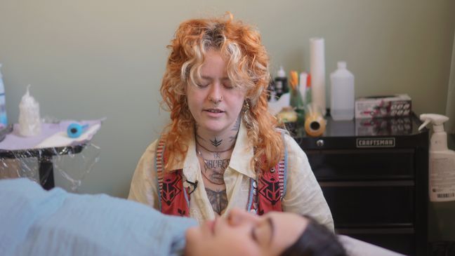 A typical intuitive tattoo session at Alsberg's private Brooklyn studio begins with "gentle" life coaching and a guided meditation. (Photo: Emily Faber, The National Desk)