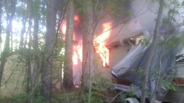 Fire officials: Man sets house on fire, flees scene, crashes into tree in Maryland. (Hollywood Volunteer Fire Department/Rick Brady)