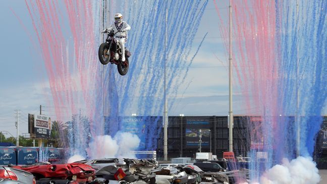 Travis Pastrana jumps his motorcycle over 52 cars as he attempts to make three of Evel Knievel's historic jumps Sunday, July 8, 2018, in Las Vegas. Pastrana successfully completed all three jumps, the cars, 16 buses and the Caesars Palace fountains, in three hours. CREDIT: Sam Morris/Las Vegas News Bureau