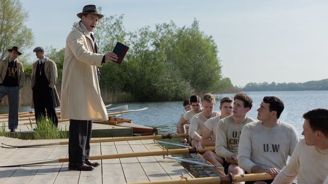 (l-r.) James Wolk star as Coach Bolles, Dominic Tighe as Coach Brown andJoel Edgerton as Coach Al Ulbrickson in director George Clooney'sTHE BOYS IN THE BOAT, an Amazon MGM Studios film. Photo credit: Laurie Sparham © 2023 Metro-Goldwyn-Mayer Pictures Inc. All Rights Reserved.