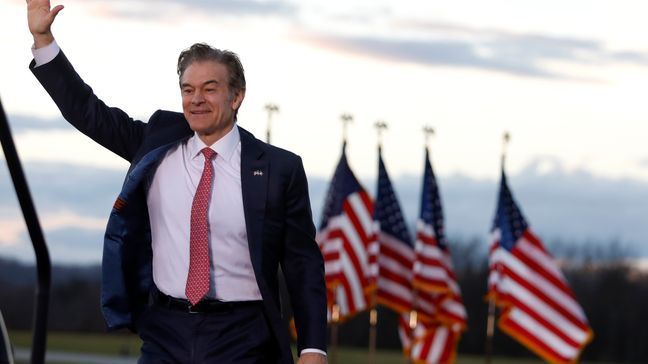 Republican candidate for U.S. Senate Dr. Mehmet Oz waves before addressing an election rally in Latrobe, Pa. Saturday, Nov. 5, 2022, before former President Donald Trump speaks. (AP Photo/Jacqueline Larma)