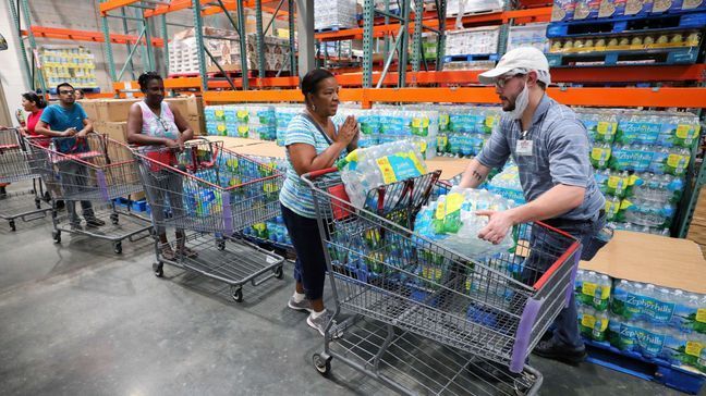 Costco is lifting some restrictions that were put in place because of the coronavirus.{&nbsp;} (Joe Burbank/Orlando Sentinel via AP)