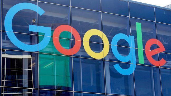 FILE - A sign is displayed on a Google building at their campus in Mountain View, Calif., on Sept. 24, 2019. (AP Photo/Jeff Chiu, File)