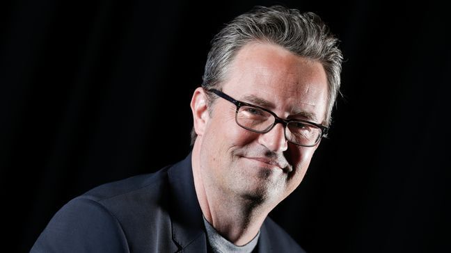 File - Matthew Perry poses for a portrait on Feb. 17, 2015, in New York. Perry, who starred as Chandler Bing in the hit series âFriends,â has died. He was 54. The Emmy-nominated actor was found dead of an apparent drowning at his Los Angeles home on Saturday, according to the Los Angeles Times and celebrity website TMZ, which was the first to report the news. Both outlets cited unnamed sources confirming Perryâs death. His publicists and other representatives did not immediately return messages seeking comment.  (Photo by Brian Ach/Invision/AP)