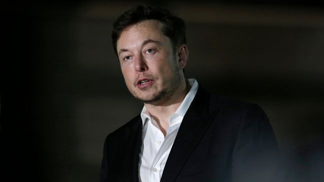 FILE- In this June 14, 2018, file photo Tesla CEO and founder of the Boring Company Elon Musk speaks at a news conference in Chicago. Musk says he is considering taking the electric car maker private. Tesla’s stock spiked Tuesday, Aug. 7, after Musk made the abrupt announcement in a terse tweet. (AP Photo/Kiichiro Sato, File)