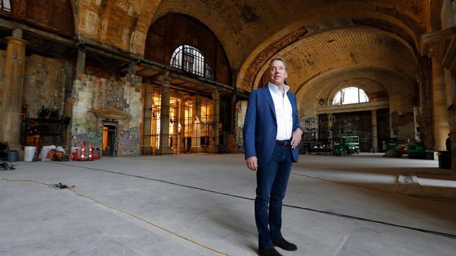 In this Thursday, June 14, 2018 photo, Bill Ford Jr., Ford Motor Company Executive Chairman and Chairman of the Board, poses in the Michigan Central Station in Detroit. Ford Motor Co. is embarking on a 4-year renovation of the 105-year-old depot and 17-story office tower just west of downtown. The massive project is expected to increase the automaker’s footprint in the city where the company was founded, provide space for electric and autonomous vehicle testing and research and spur investment in the surrounding neighborhood. (AP Photo/Paul Sancya)