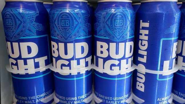 FILE - Cans of Bud Light chill in a refrigerator in Oakland, Calif., Friday, April 28, 2023. (AP Photo/Jeff Chiu)