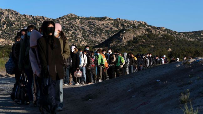 FILE - Chinese migrants wait to be processed after crossing the border with Mexico on May 8, 2024, near Jacumba Hot Springs, Calif. (AP Photo/Ryan Sun,File)