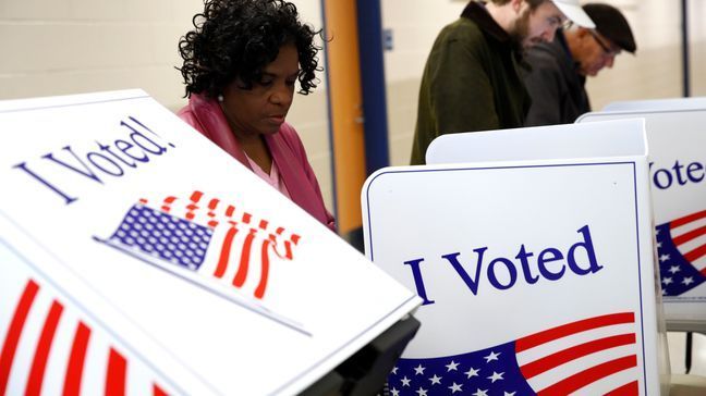 FILE - Voters fill out their ballots at a polling place, Feb. 29, 2020, in Charleston, S.C. (AP Photo/Patrick Semansky, File)