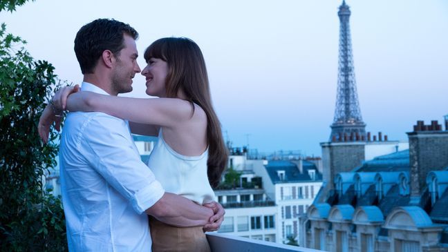 JAMIE DORNAN and DAKOTA JOHNSON return as Christian Grey and Anastasia Steele in "Fifty Shades Freed," the climactic chapter based on the worldwide bestselling “Fifty Shades” phenomenon. (Universal Pictures)