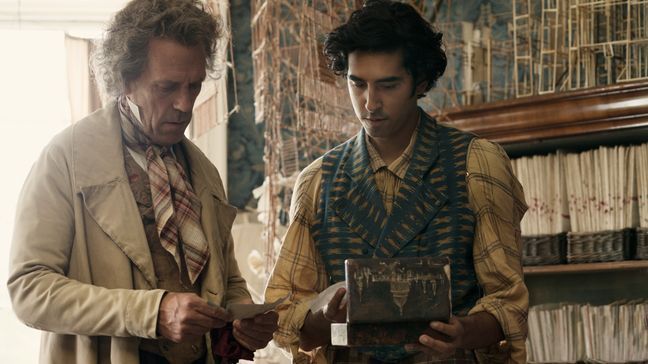 Hugh Laurie and Dev Patel in the film THE PERSONAL HISTORY OF DAVID COPPERFIELD. Photo by Dean Rogers. © 2020 20th Century Studios All Rights Reserved