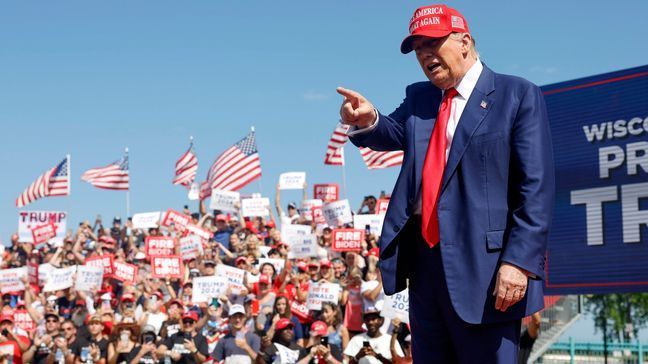 FILE - Republican presidential candidate former President Donald Trump walks to the podium at a campaign event Tuesday, June 18, 2024, in Racine, Wis. (AP Photo/Jeffrey Phelps)