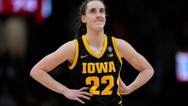 Iowa guard Caitlin Clark stands on the court during the second half of the Final Four college basketball championship game against South Carolina in the women's NCAA Tournament, Sunday, April 7, 2024, in Cleveland. (AP Photo/Carolyn Kaster)