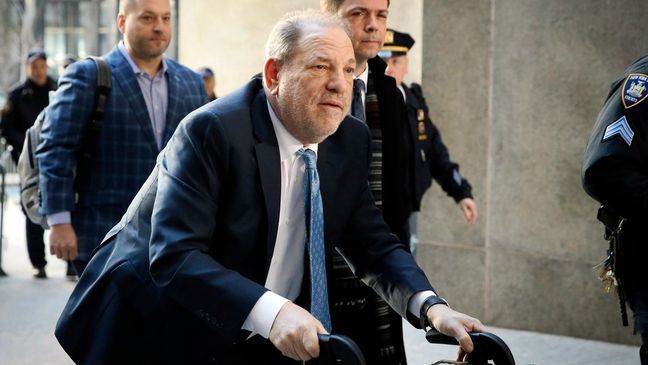 FILE - Harvey Weinstein arrives at a Manhattan courthouse as jury deliberations continue in his rape trial in New York, on Feb. 24, 2020. (AP Photo/John Minchillo, File)