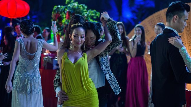 (Center L-R) FIONA XIE as Kitty and JIMMY O. YANG as Bernard in Warner Bros. Pictures', SK Global Entertainment's and Starlight Culture's contemporary romantic comedy "CRAZY RICH ASIANS," a Warner Bros. Pictures release. (Warner Bros.)