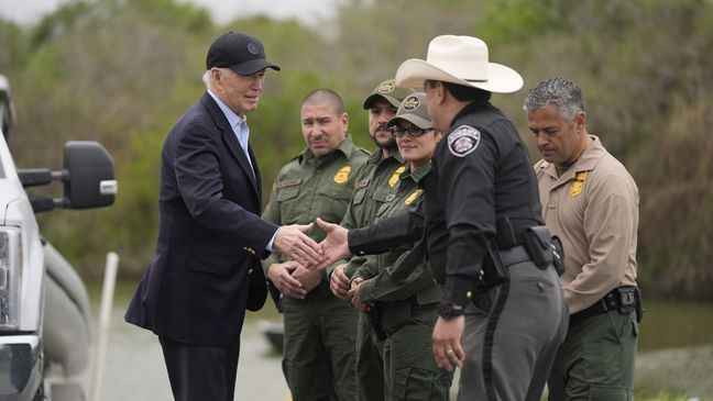 FILE - President Joe Biden talks with the U.S. Border Patrol and local officials, as he looks over the southern border, Feb. 29, 2024, in Brownsville, Texas, along the Rio Grande. (AP Photo/Evan Vucci, File)