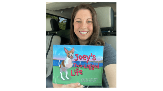 Kristen Peralta, who is the co-founder and executive director of Vintage Pet Rescue, a nonprofit organization in Rhode Island that primarily cares for senior dogs, is also the author of "Joey's Two-Legged Life." (Photo: Kristen Peralta){&nbsp;}