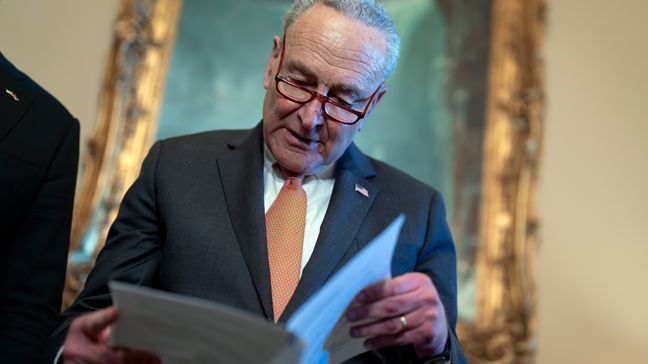 Senate Majority Leader Chuck Schumer, D-N.Y., looks over his notes during a meeting with Ukraine's Prime Minister Denys Shmyhal as Congress moves to advance an emergency foreign aid package for Israel, Ukraine and Taiwan, at the Capitol in Washington, Thursday, April 18, 2024. (AP Photo/J. Scott Applewhite)