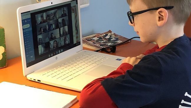 An East Greenwich student attends a second-grade class through remote learning. (Katie/Chime In)