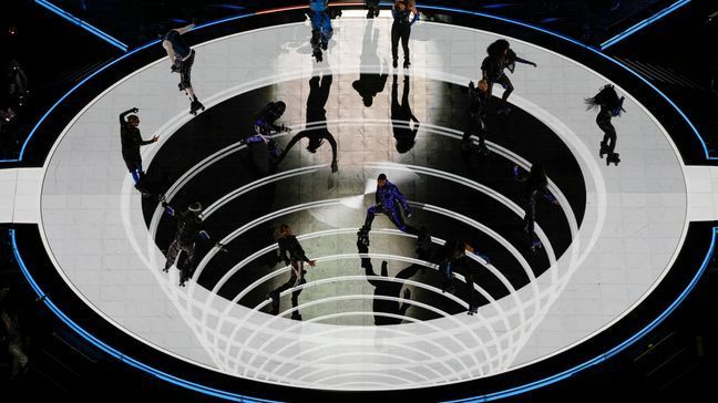 Usher, center, performs during halftime of the NFL Super Bowl 58 football game between the San Francisco 49ers and the Kansas City Chiefs Sunday, Feb. 11, 2024, in Las Vegas. (AP Photo/David J. Phillip)