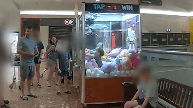 Toddler rescued after becoming trapped in claw machine (Queensland Police Department)