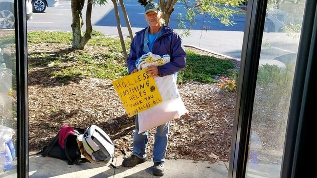 Photo: Homeless citizens receive mats made of recycled plastic bags Courtesy: Dee Barrett