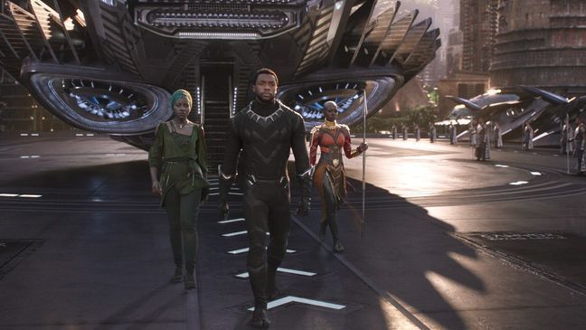 l-r Lupita Nyong'o, Chadwick Boseman and Danai Gurira star in Marvel Studio's BLACK PANTHER (Photo: Walt Disney Pictures){p}{/p}